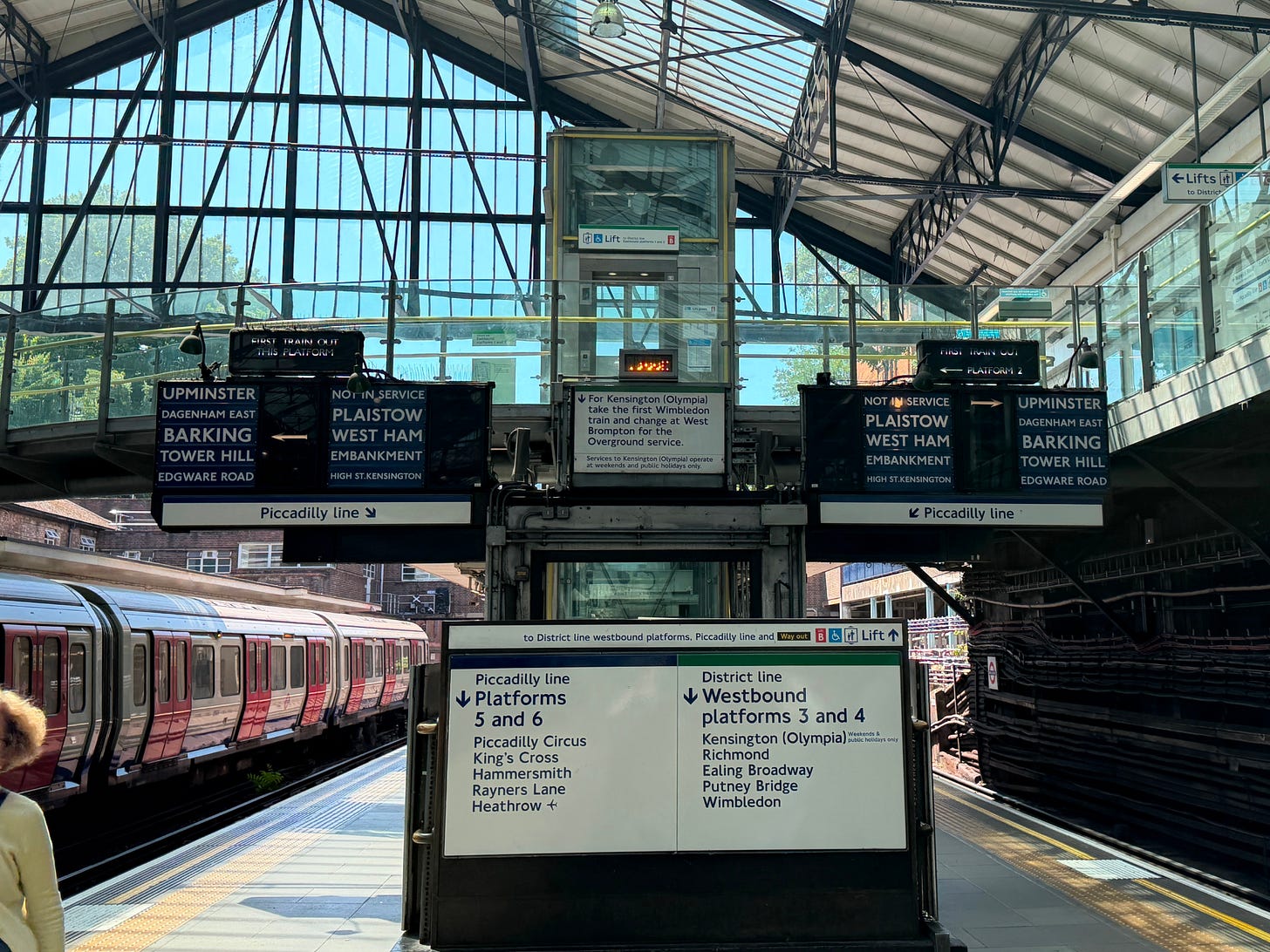 Photo of original next train information indicators at Earl's Court. Photo of original next train information indicators at Earl's Court.
