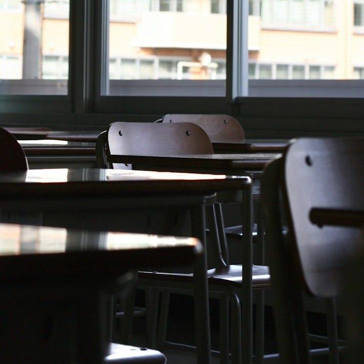 a room with a table and chairs a room with a table and chairs