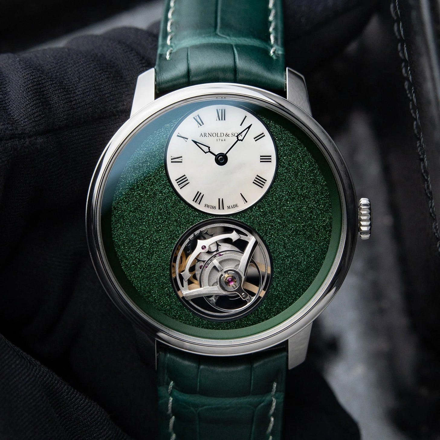 Arnold & Son Chronometry Ultrathin Tourbillon 41.5 Platinum / MOP/Green / Roman / Strap - Limited to 28 Pieces 1UTBX.F01A.C208A Listing Image 1 Arnold & Son Chronometry Ultrathin Tourbillon 41.5 Platinum / MOP/Green / Roman / Strap - Limited to 28 Pieces 1UTBX.F01A.C208A Listing Image 1