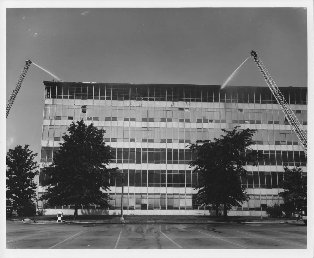 Firefighters spraying water on the burning National Personnel Records Center building in 1973 Firefighters spraying water on the burning National Personnel Records Center building in 1973