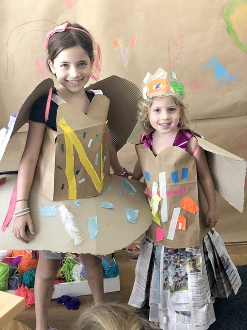 GIrls wearing handmade kids costumes