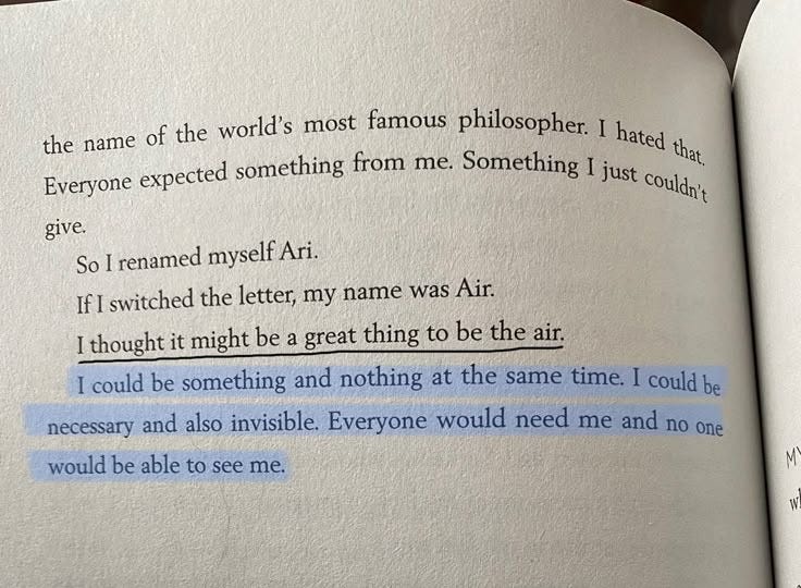 This may contain: an open book with some writing on the page and one line in it's center This may contain: an open book with some writing on the page and one line in it's center