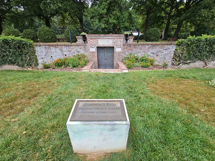 The reflecting pool, garden area, and brick sidewalks in Morven Park gardens.