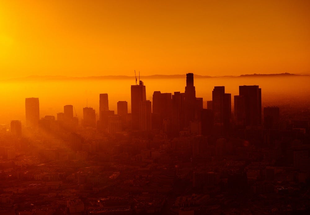 silhouette photo of city skyline silhouette photo of city skyline