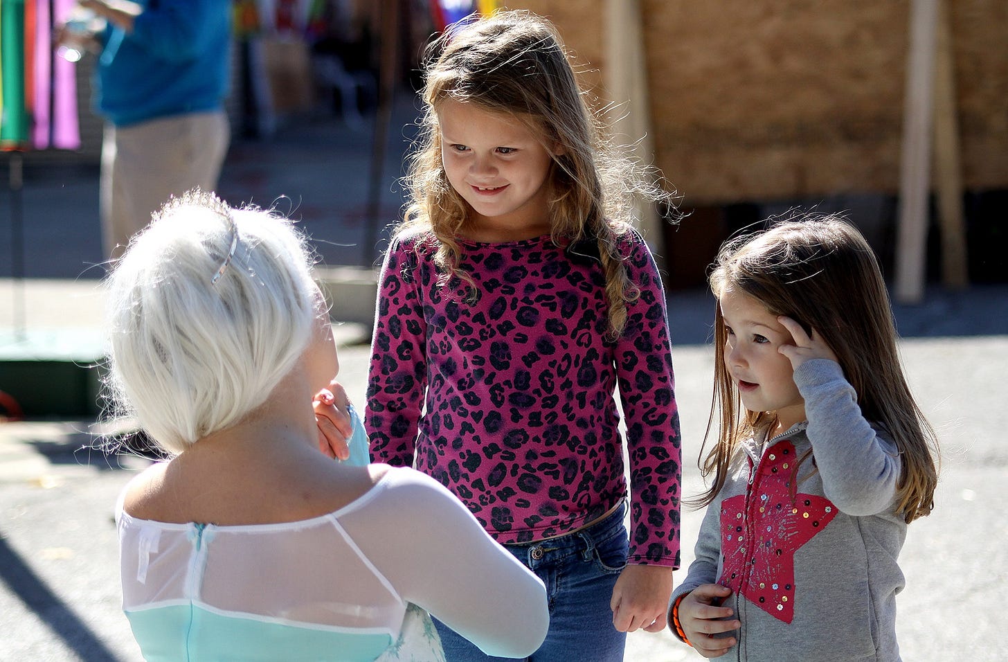A look of wonder passes over the faces of two young ladies meeting the heroine of the hit children’s movie Frozen.