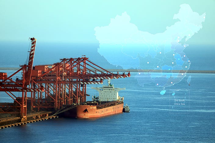 A cargo ship docks on May 8 at a port in Rizhao, East China’s Shandong province. China has created more than 20 Free Trade Zones since September 2013. Photo: VCG