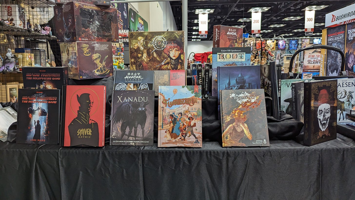 ENNIE Awards display booth at Gen Con 2023, featuring many of the nominated games.