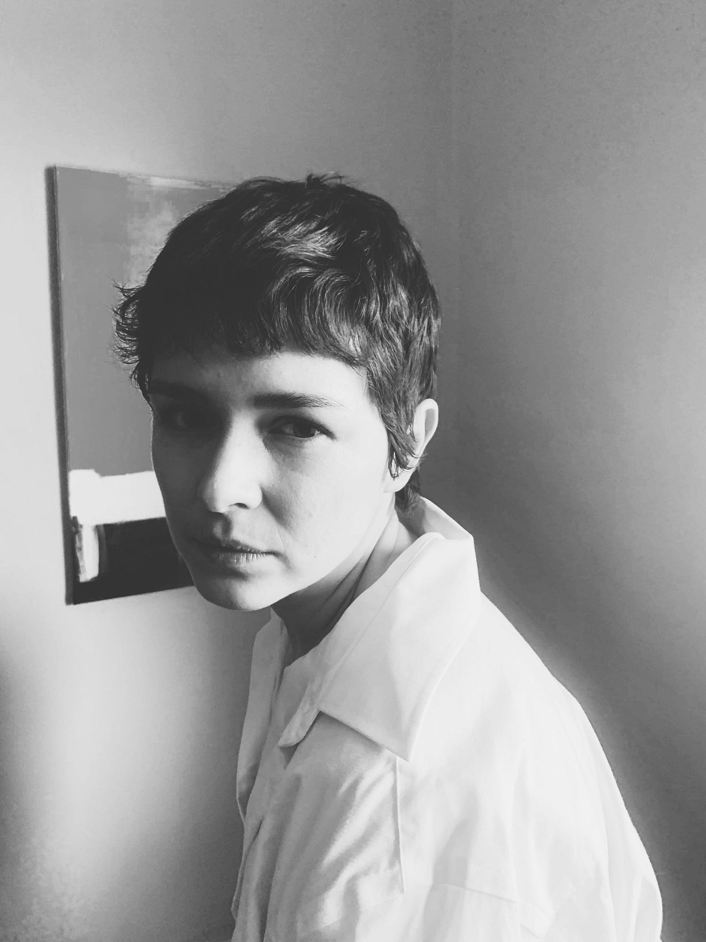 Author A.D. Sui in black and white