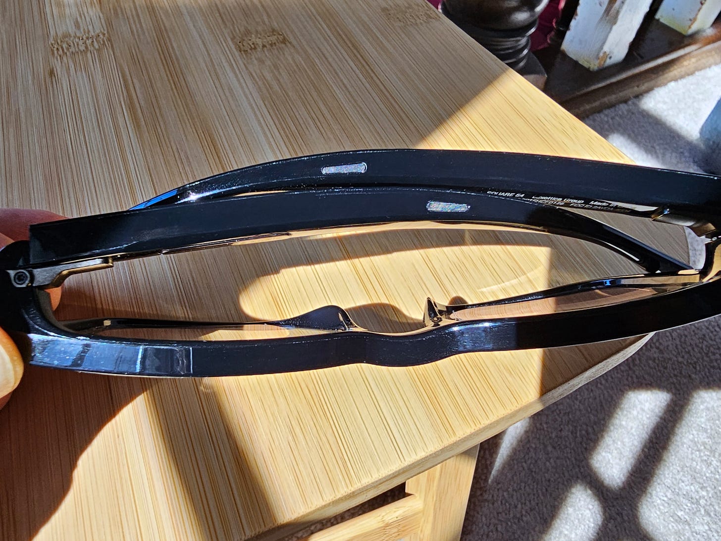Top view of a folded set of Nuance Audio Hearing Glasses.