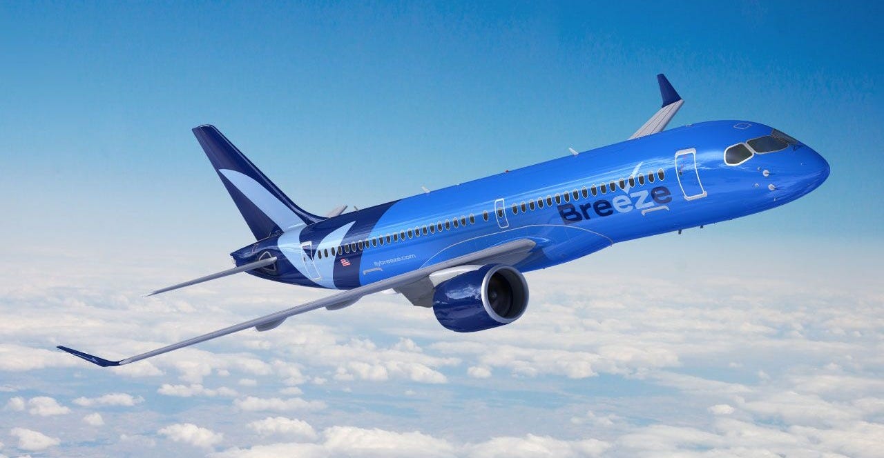 Breeze Airways Airbus A220 airplane in flight