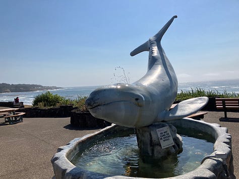 Depoe Bay harbor, coast, and whale sculpture
