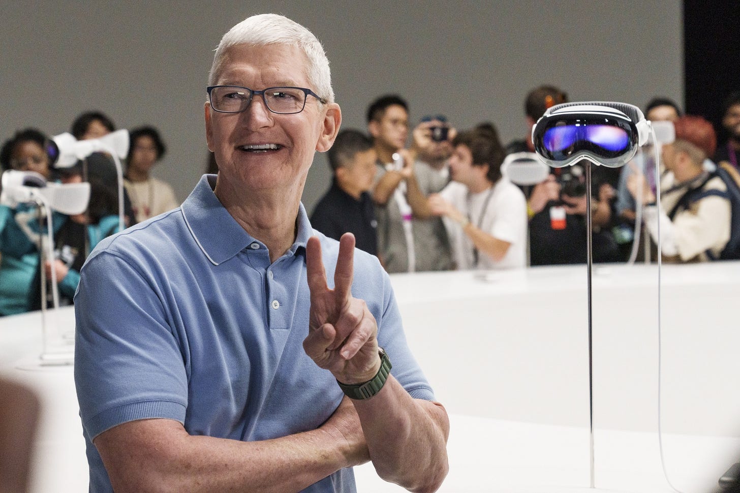 Tim Cook with the Apple Vision Pro.
