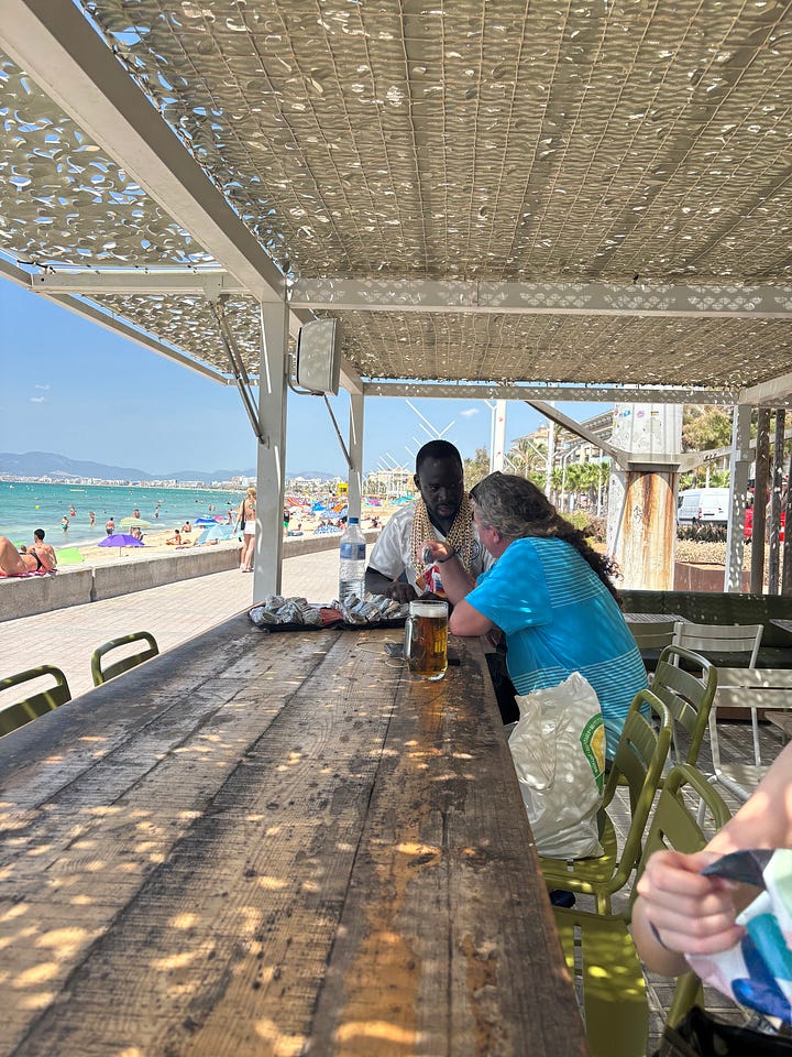 Gavin and Mr T at a beach bar in S'Arenal
