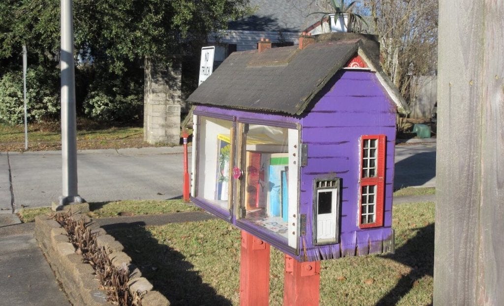 A cute purple little free library accompanies an article about how to build little free libraries A cute purple little free library accompanies an article about how to build little free libraries