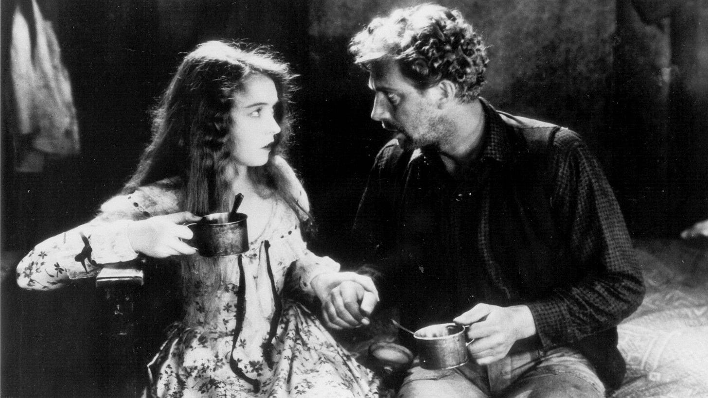 The Wind | Still features Lillian Gish as Letty in the company of another man.