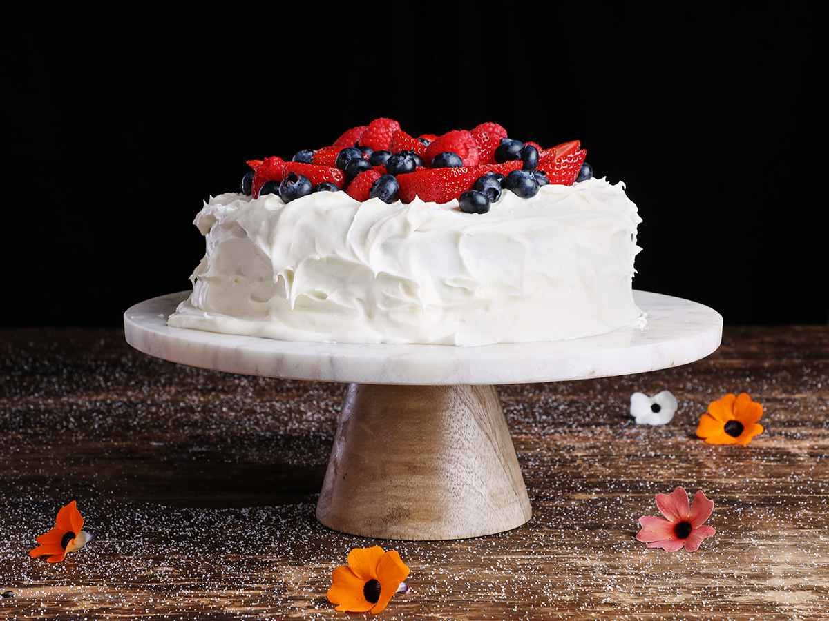Tres Leches Cake with Berries on Pedestal