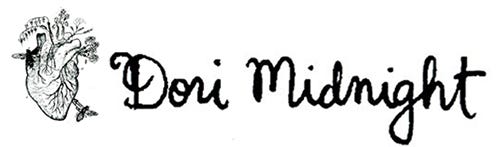 Dori Midnight written in hand lettering and an image for her log of a human heart with plants and birds embedded in it Dori Midnight written in hand lettering and an image for her log of a human heart with plants and birds embedded in it