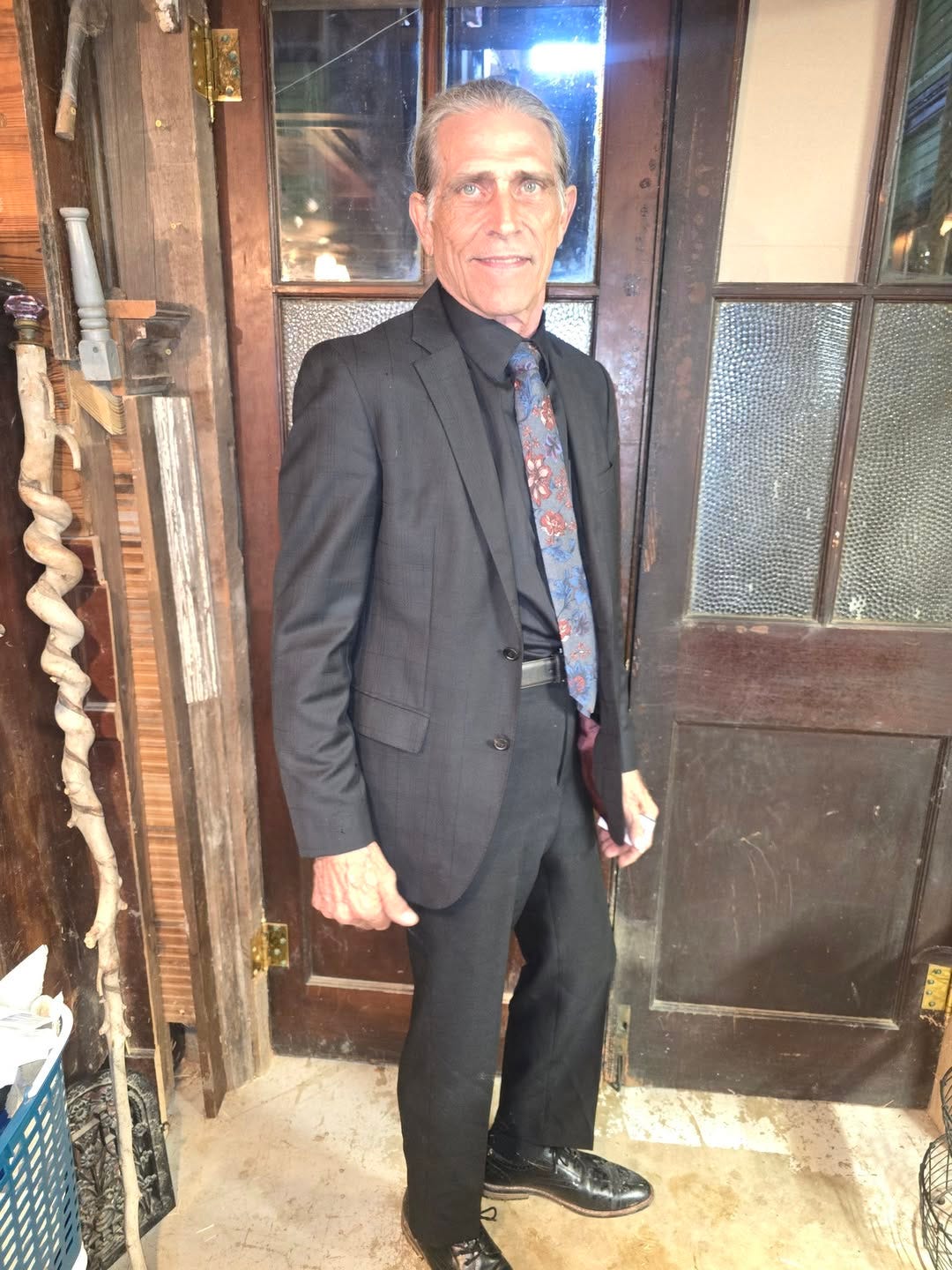 May be an image of one or more people and wingtip shoes