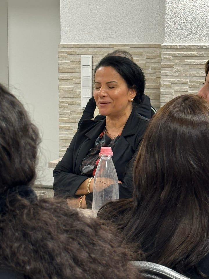 People sitting together in a room
