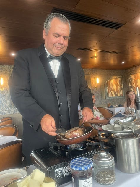 My photos of our amazing meal, our table-side waiter, and the fancy wine room.