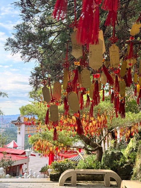 Images from a gondola right and temple visits in Taipei