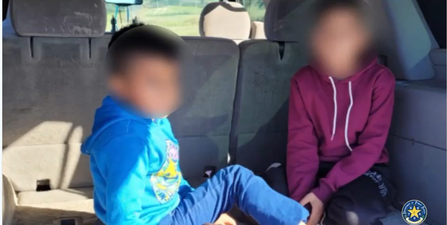 Texas DPS Trooper body camera image of two 7 & 9 year old Mexican children found inside the cargo area of a Human Smuggler’s vehicle stopped by officers following a chase through Kinney County near the Rio Grande in November, 2023, (Texas Department of Public Safety image)