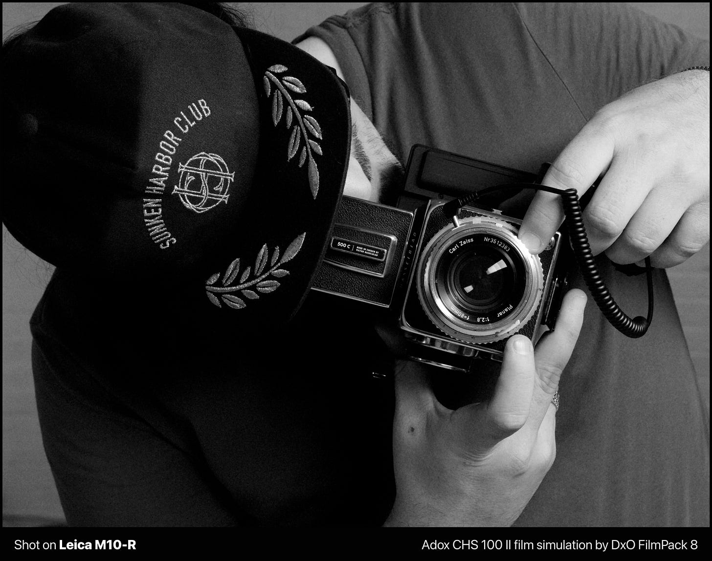 Brian in the studio with his Hasselblad 500CM connected to a flash transmitter