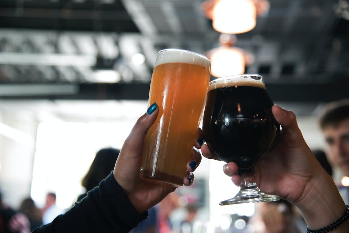 Free Selective Focus Photography Of People Having A Toast Stock Photo