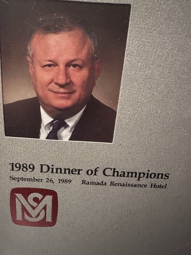 May be an image of 1 person and text that says '1989 Dinner of Champions September 26, 1989 Ramada RenaissanceHotel Renaissa M'