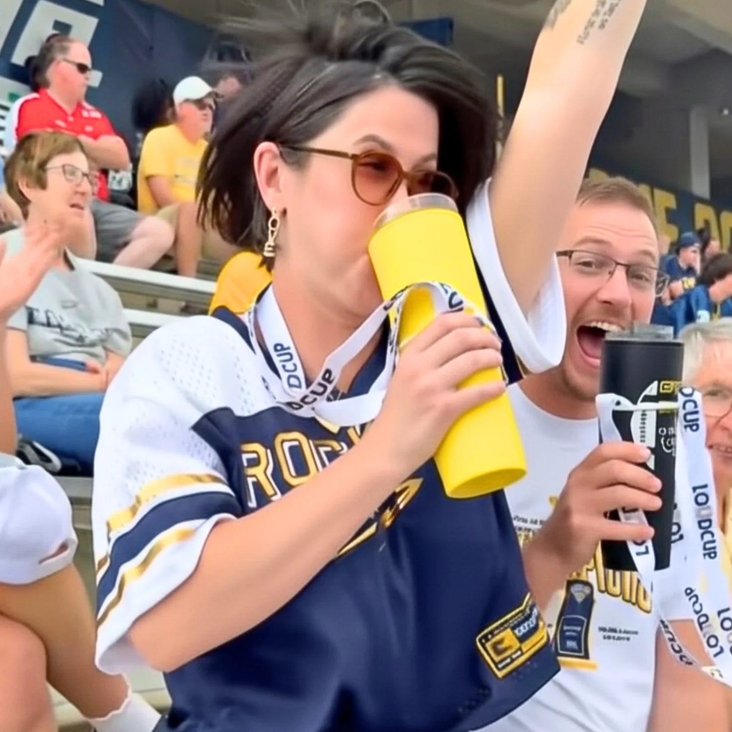 A person drinking from a yellow cup

AI-generated content may be incorrect.