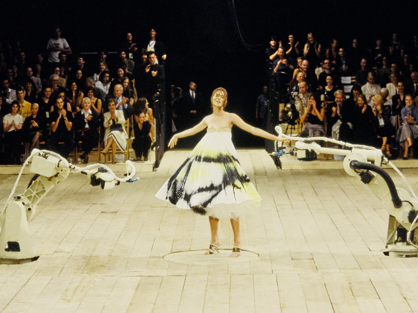 Show to Know: When Alexander McQueen's Robots Spray-Painted Shalom Harlow |  Allure