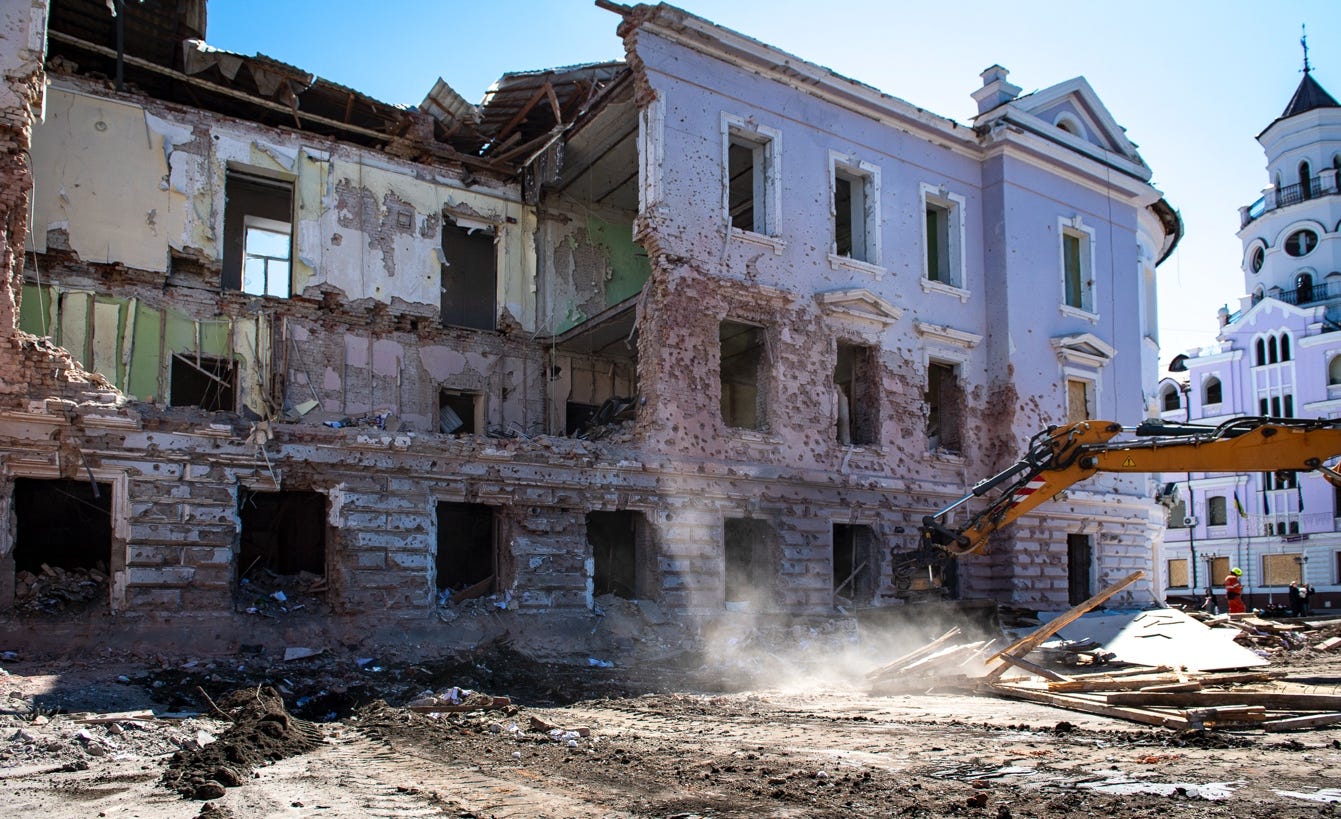 A construction site with a building being demolished

AI-generated content may be incorrect.