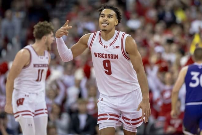 Wisconsin 85, Holy Cross 61: John Tonje's 23 points led the Badgers on  opening night.