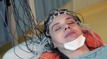 A person with a device on her head
Description automatically generated A person with a device on her head
Description automatically generated