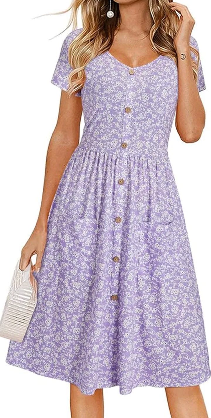 A purple floral dress, a woman wearing a white shirt, grey sneakers, and a white tote bag.