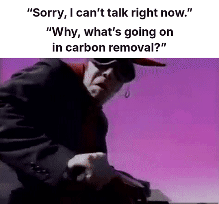 Two lines of dialogue: "Sorry, I can't talk right now." "Why, what's going on in carbon removal?" Below, Tom Waits in a red devil costume and sunglasses pedals a tiny red tricycle across a gravel lot, then takes a phone call.