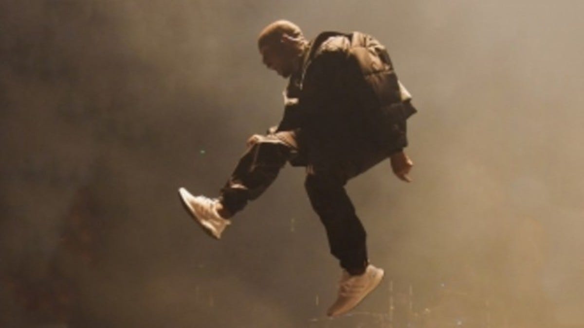 Kanye West Performs in Another All-White adidas Running S...