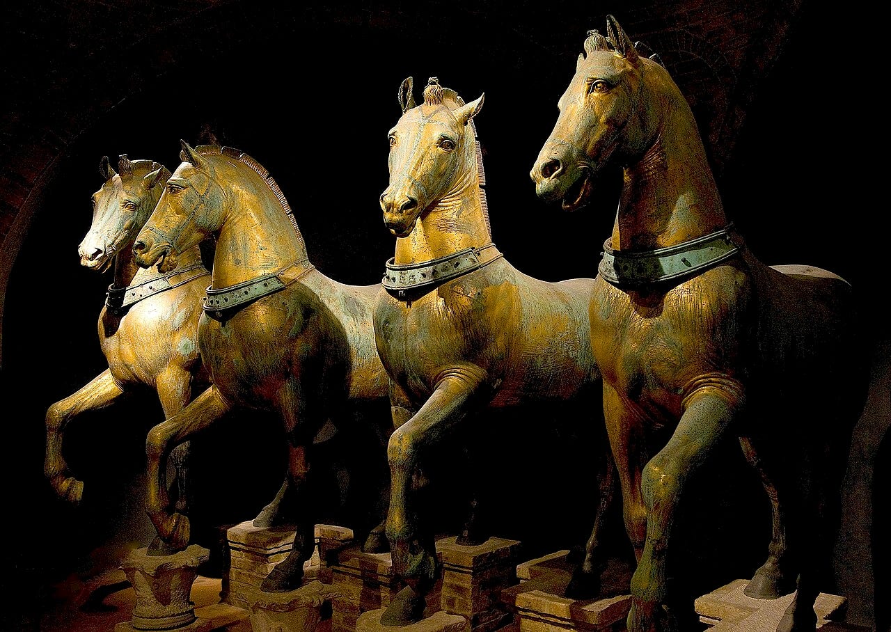 Four gilded bronze horses