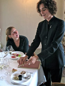 Malvira – Sylvie shaves truffles over egg dish Malvira – Sylvie shaves truffles over egg dish
