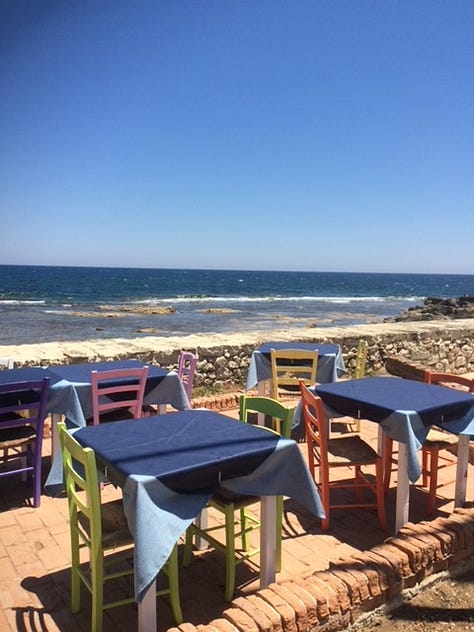 bounganvilla, coffee granita with panna colorful chair and stone buildings in Siciliy cannoli prickly pear cactus Sicily the blue sea