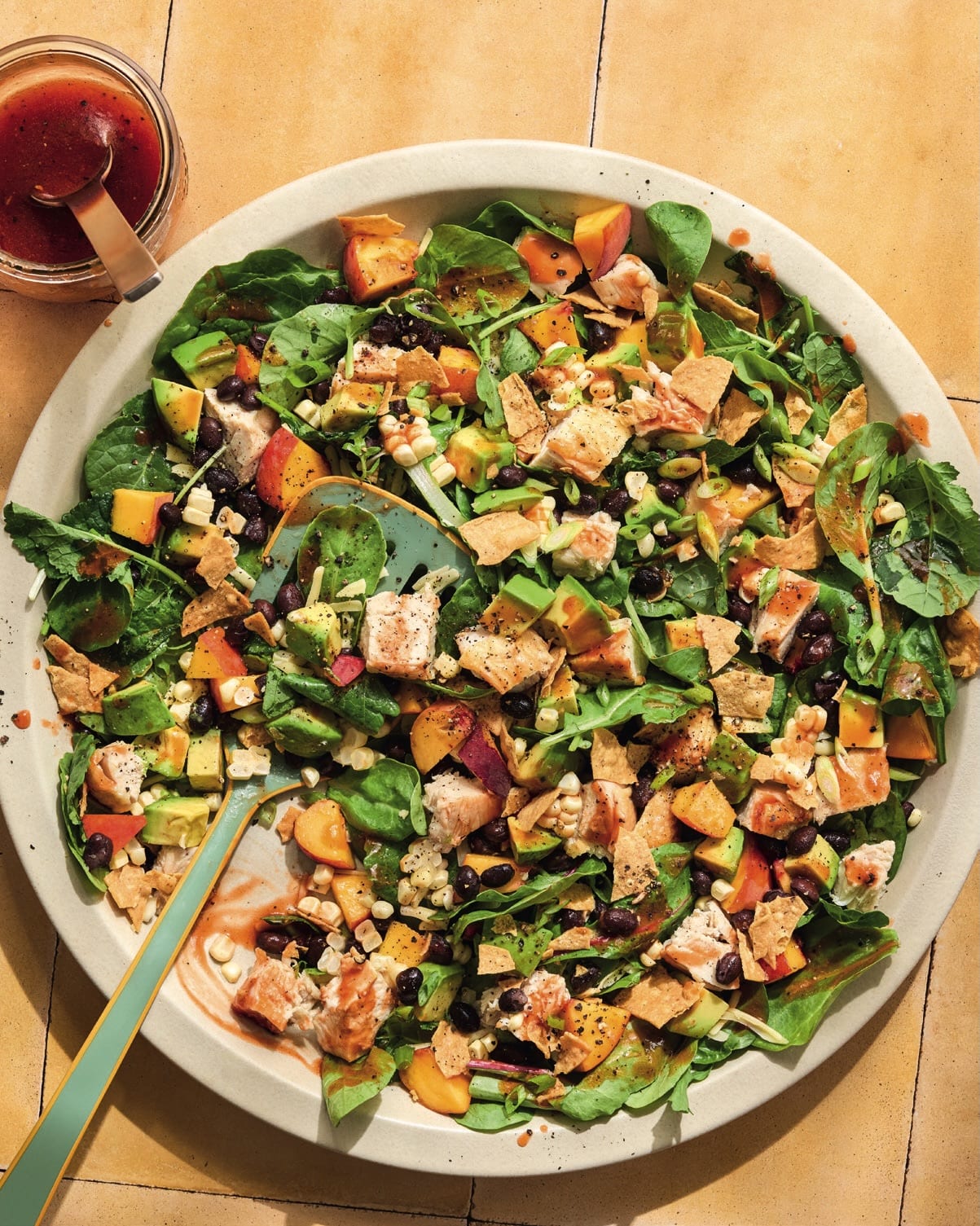 Bbq chicken chop salad recipe with peaches from Caroline Chambers. Bbq chicken chop salad recipe with peaches from Caroline Chambers.