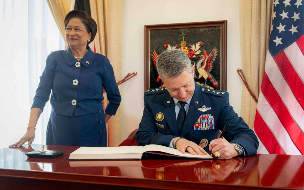 Kamla Persad-Bissessar Dan Caine Kamla Persad-Bissessar Dan Caine
