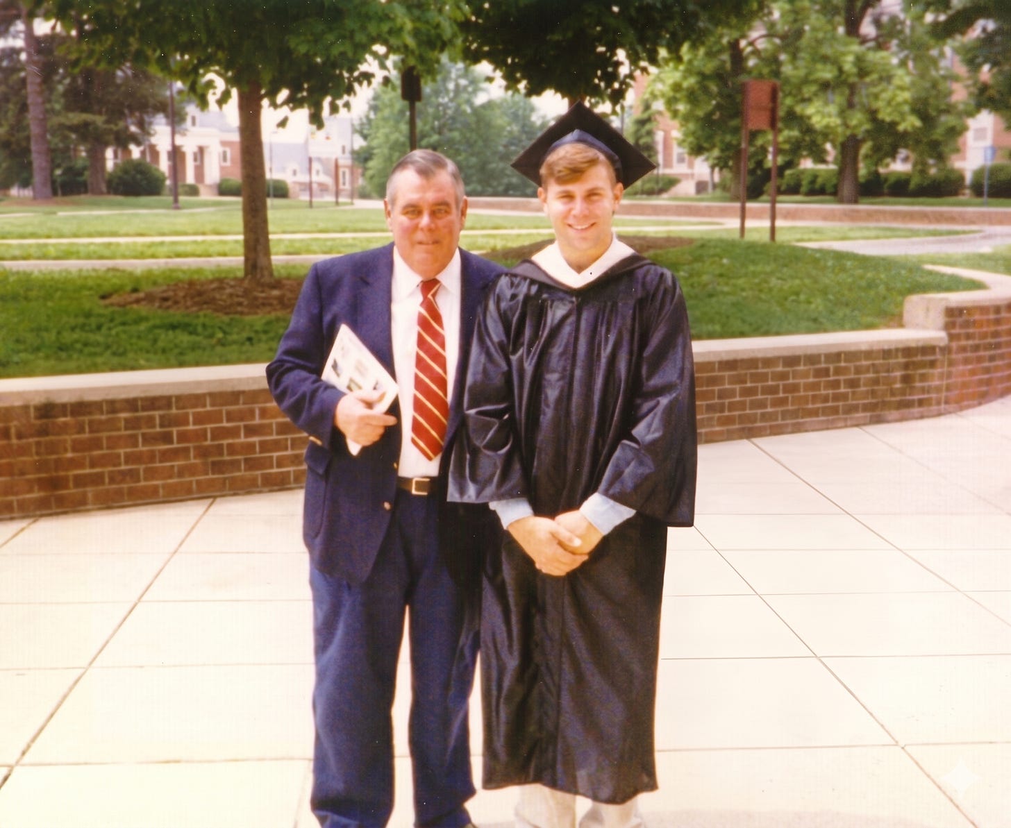 My dad with me on my graduation day in May 1993