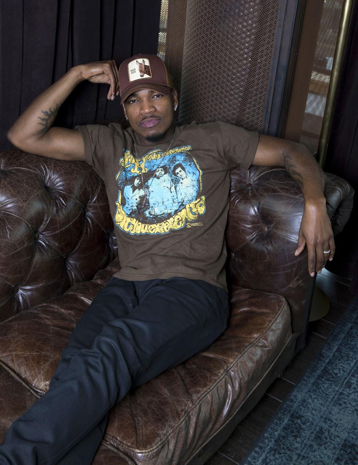 ne yo sprawled out on hot leather bulge sofa ne yo sprawled out on hot leather bulge sofa