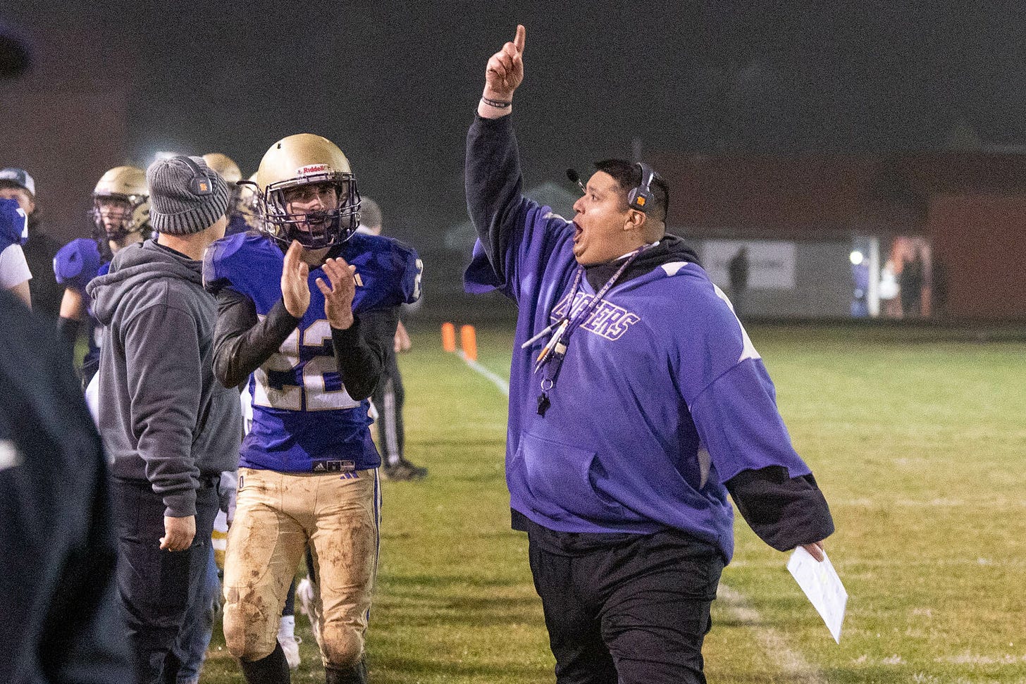 Onalaska’s Sam Pannkuk and head coach Mazen Saade celebrate a turnover during the Loggers’ 2B State Football Tournament round of 16 win over Newport at Onalaska High School on Friday, Nov. 15. Onalaska’s Sam Pannkuk and head coach Mazen Saade celebrate a turnover during the Loggers’ 2B State Football Tournament round of 16 win over Newport at Onalaska High School on Friday, Nov. 15.