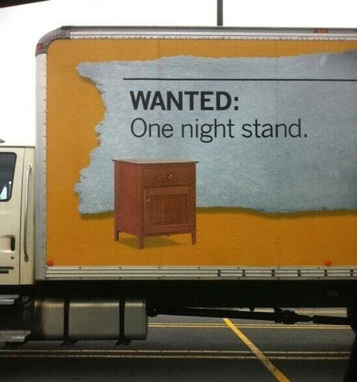 This may contain: a semi truck with an advertisement on it's side