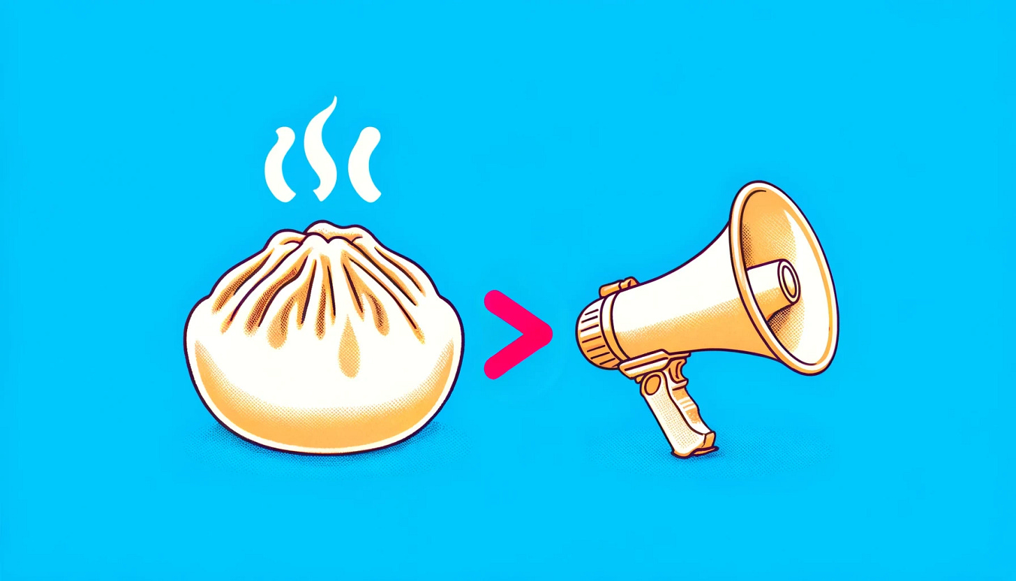 An image of a dumpling, a greater than symbol, and a megaphone representing hype. 