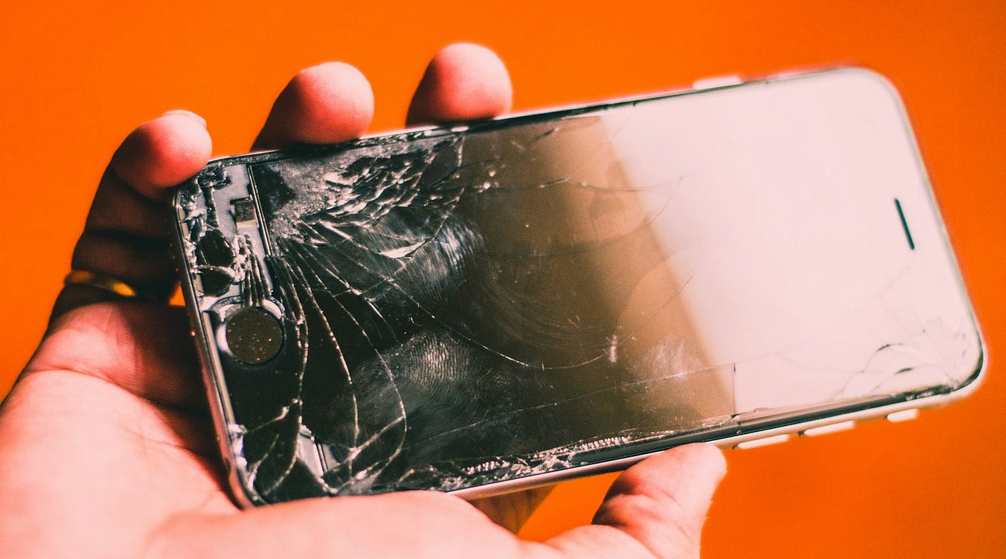 person holding space gray iPhone 6 person holding space gray iPhone 6