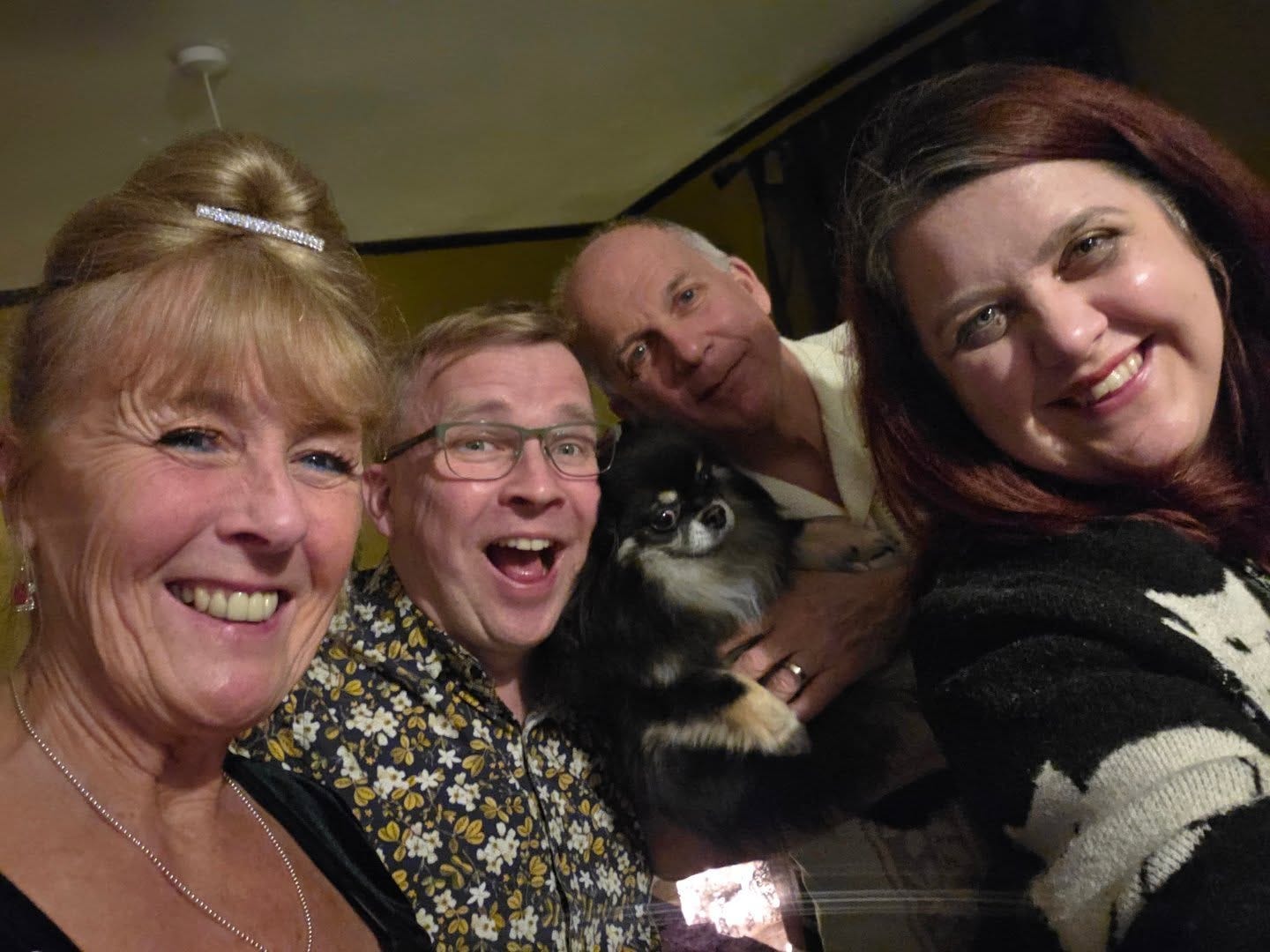 May be an image of smiling