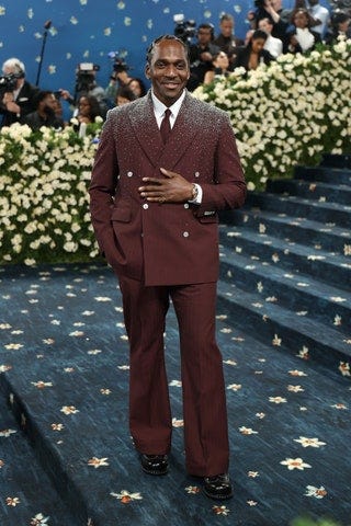 Image may contain Pusha T Person Standing Accessories Formal Wear Tie Clothing Suit Adult Footwear and Shoe